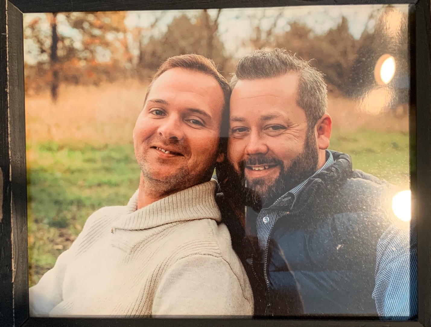 Jared Lacy, shown on the right, and husband, Terry.