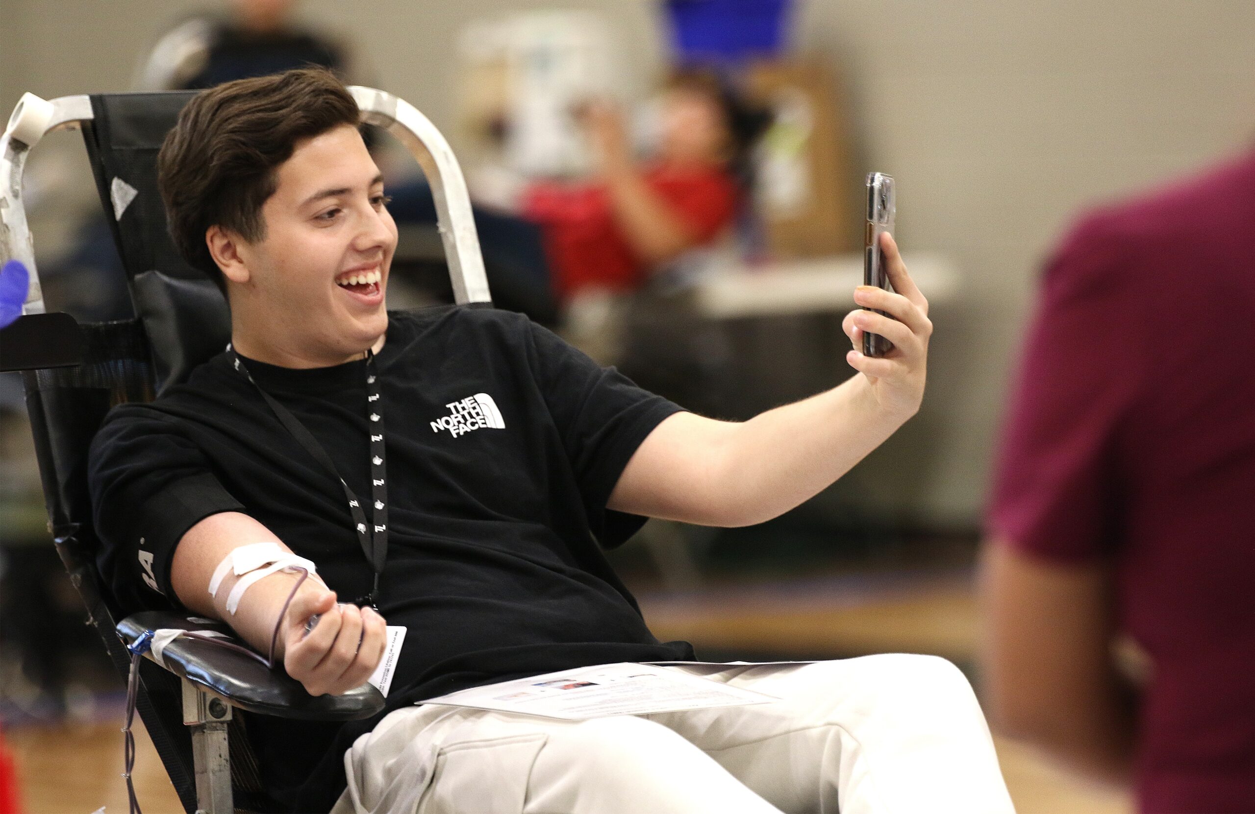 Photo of high school blood donor taking a selfie