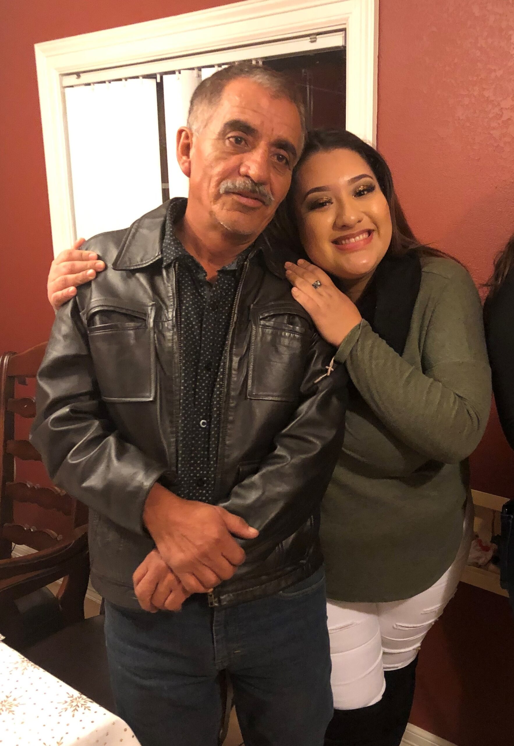 Blood recipient and father Raul Torres with his daughter