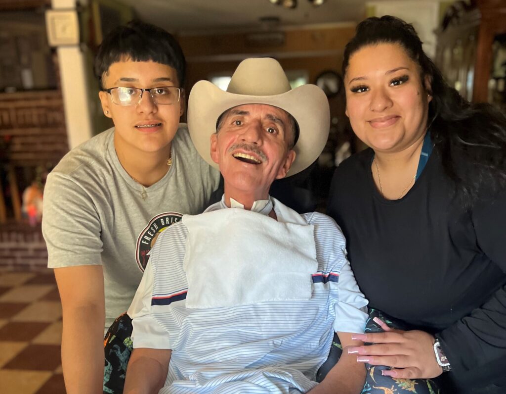 Blood recipient and father Raul Torres with his family