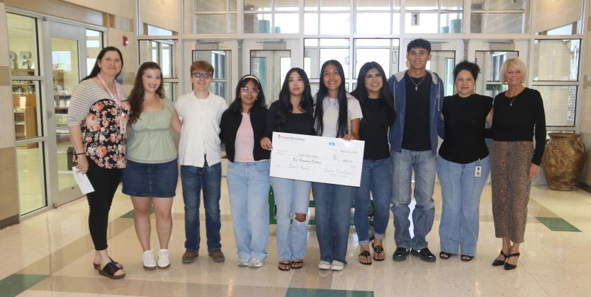 Carter Blood Care presents check to Dublin High School
